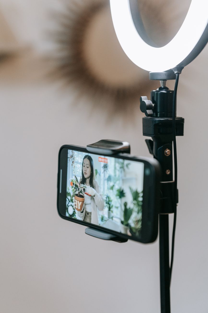 cellphone and ring light on a stand